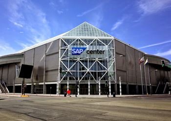 the sap center on the corner of a city street